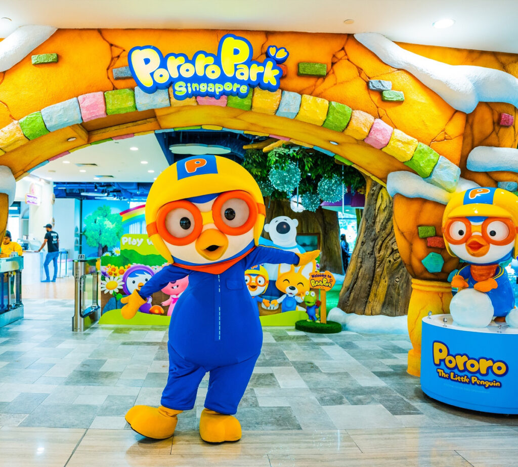 Pororo posing in front of Pororo Park. Korean Animation Playground for Kids